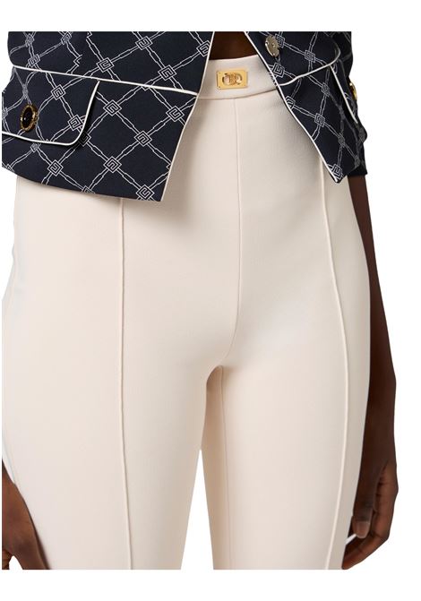 Crepe flared trousers with logo plaque ELISABETTA FRANCHI | Trousers | PA07951E2193